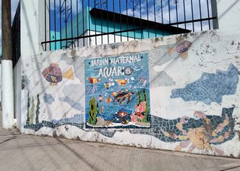 En el acto de escrituración de viviendas, el Jardín Acuario concretó su regularización dominial.